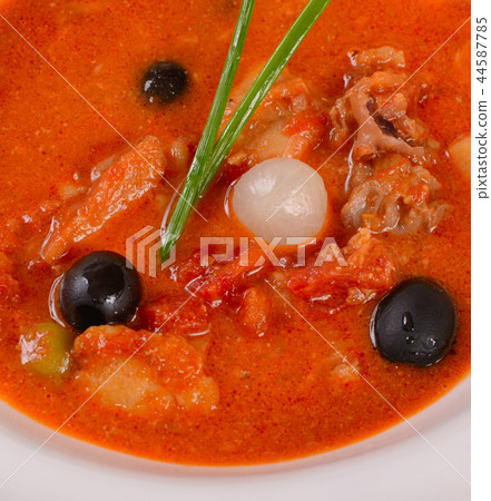 Solyanka soup with olives and onions close up Solyanka soup with olives and onions close up 44587785