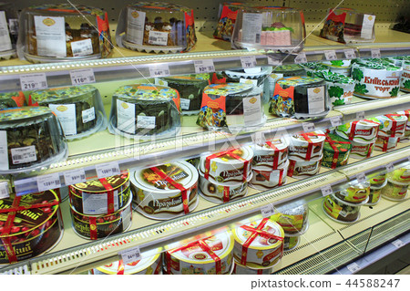 cakes on the shelves of supermarket. Shop sweet cakes on the shelves of supermarket. Shop sweet 44588247