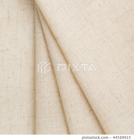 Soft linen fabric for clothing. Background with natural fabrics Soft linen fabric for clothing. Background with natural fabrics 44589915