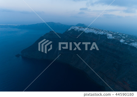 Aerial view of famous Greek resort Thira before sunrise. 44590180