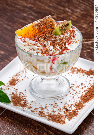 Refreshing summer dessert. Vanilla ice cream and chocolate Refreshing summer dessert. Vanilla ice cream and chocolate 44590694