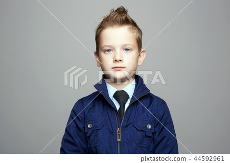 fashionable blue eyed boy. fashion hairstyle child fashionable blue eyed boy. fashion hairstyle child 44592961