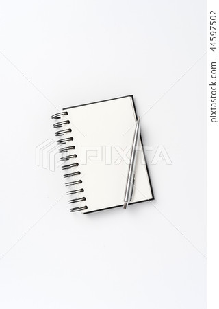 Office desktop with notebook and pen 44597502