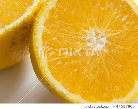 Close-up of sliced juicy orange halves. 44597906