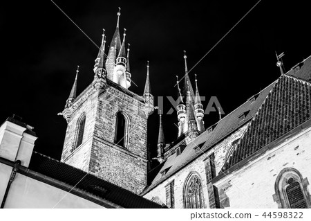 Two gothic towers of Church Of Our Lady Before Tyn at Old Town Square by night. Prague, Czech 44598322