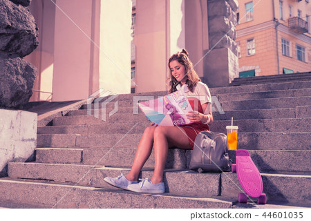 Fashion school student feeling involved in preparation to the important exam Fashion school student feeling involved in preparation to the important exam 44601035