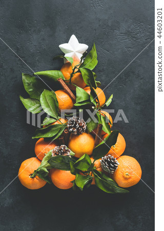Christmas Tree made of tangerines Christmas Tree made of tangerines 44603201