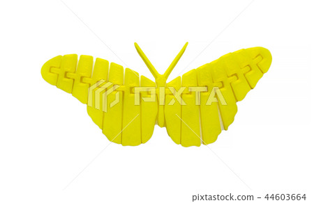 Bright light yellow object in shape of butterfly toy printed on 3d printer Bright light yellow object in shape of butterfly toy printed on 3d printer 44603664