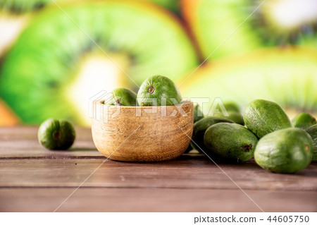 Fresh green mini baby kiwi fruit with sliced kiwi Fresh green mini baby kiwi fruit with sliced kiwi 44605750