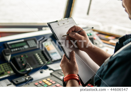 Marine navigational officer or chief mate on navigation watch 44606547