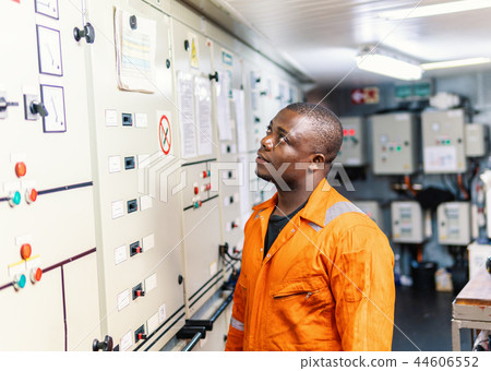 Marine engineer officer working in engine room 44606552