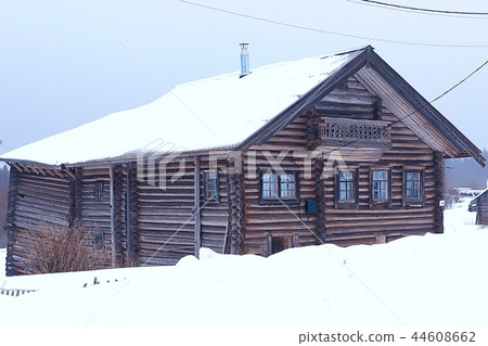 wooden houses in the Russian countryside / wooden architecture, Russian provincial landscape, winter view village in Russia 44608662