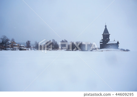 landscape in russian kizhi church winter view / winter season snowfall in landscape with church architecture landscape in russian kizhi church winter view / winter season snowfall in landscape with church architecture 44609295