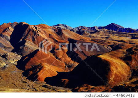 multi-colored mountains landscape 44609418