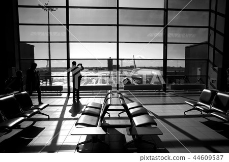 People in the terminal at the airport 44609587