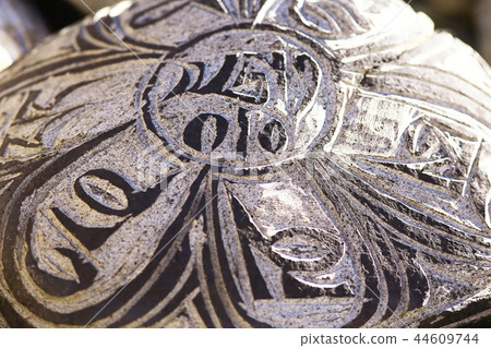 Buddhist religious symbols inscriptions in Tibet old runes 44609744