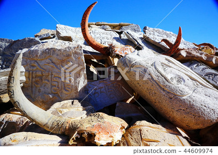 Buddhist religious symbols inscriptions in Tibet old runes 44609974