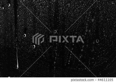 black wet background / raindrops for overlaying on window, concept of autumn weather, background of drops of water rain on glass transparent 44611105