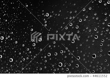black wet background / raindrops for overlaying on window, concept of autumn weather, background of drops of water rain on glass transparent 44611552