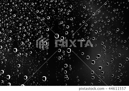 black wet background / raindrops for overlaying on window, concept of autumn weather, background of drops of water rain on glass transparent black wet background / raindrops for overlaying on window, concept of autumn weather, background of drops of water rain on glass transparent 44611557