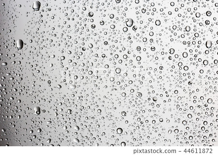gray wet background / raindrops to overlay on the window, weather, background drops of water rain on the glass transparent gray wet background / raindrops to overlay on the window, weather, background drops of water rain on the glass transparent 44611872