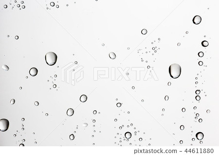 white isolated background water drops on the glass / wet window glass with splashes and drops of water and lime, texture autumn background white isolated background water drops on the glass / wet window glass with splashes and drops of water and lime, texture autumn background 44611880