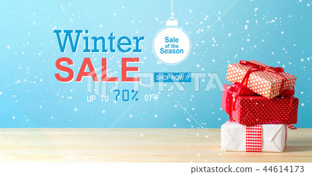Winter sale message with Christmas gift boxes Winter sale message with Christmas gift boxes 44614173