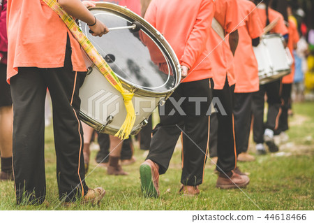 Marching band drummers perform in school parade 44618466