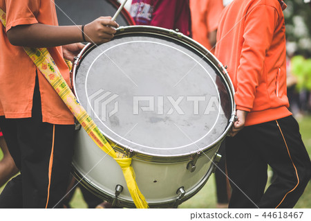 Marching band drummers perform in school parade Marching band drummers perform in school parade 44618467