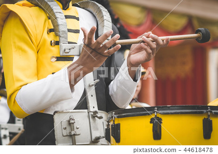 Marching band drummers perform in school parade Marching band drummers perform in school parade 44618478