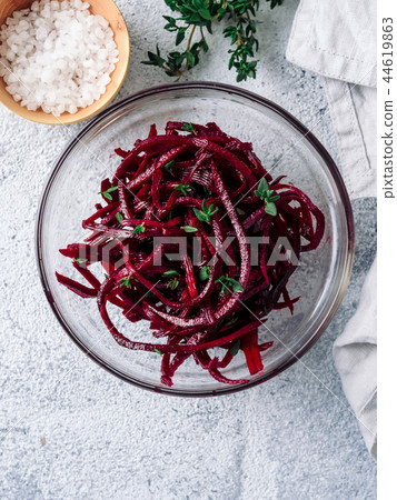 Raw beetroot noodles or beet spaghetti salad Raw beetroot noodles or beet spaghetti salad 44619863