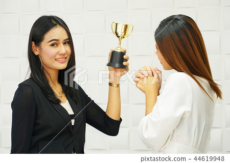 Business woman show winner trophy  44619948
