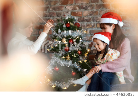 Families enjoying Christmas Families enjoying Christmas 44620853