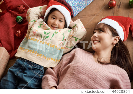 Families enjoying Christmas Families enjoying Christmas 44620894