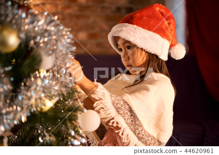 Kid enjoying christmas 44620961