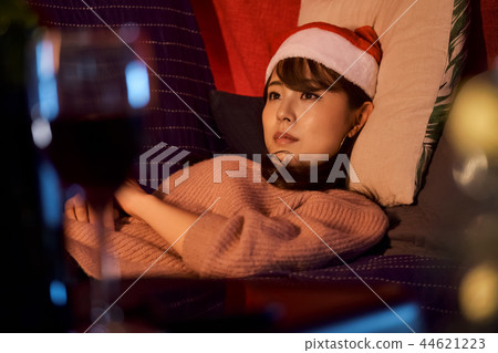 Woman spending christmas 44621223