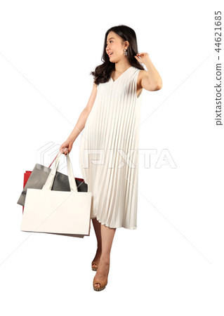 Shopaholic woman with a shopping bags 44621685
