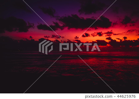Colorful bright sunset or sunrise at beach 44625976