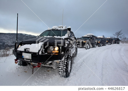 SUV on snow 44626817
