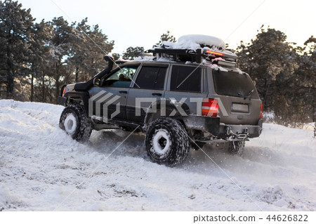 SUV on snow 44626822