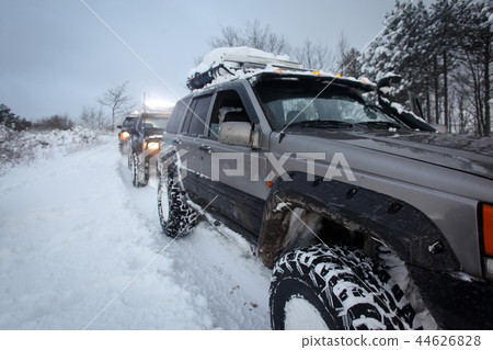 SUV on snow 44626828