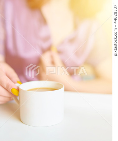 Woman drink coffee in bed 44628337