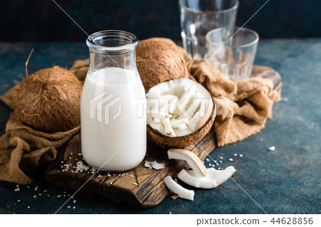 Fresh coconut milk in glass bottle Fresh coconut milk in glass bottle 44628856