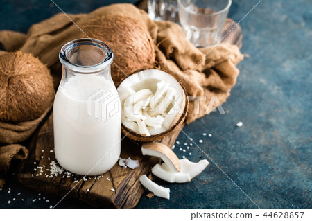 Fresh coconut milk in glass bottle Fresh coconut milk in glass bottle 44628857