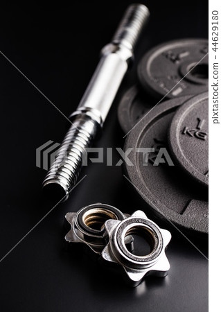 Dumbbell with black weight. Dumbbell with black weight. 44629180