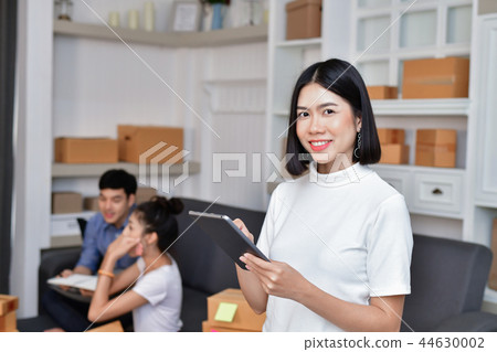 Sme business concept. Young Asian people are packing their packa 44630002