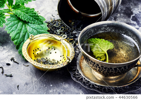 Green melissa herbal tea Green melissa herbal tea 44630566