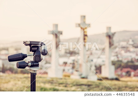 Photo tripod and Calvary in Nitra, yellow filter 44635548