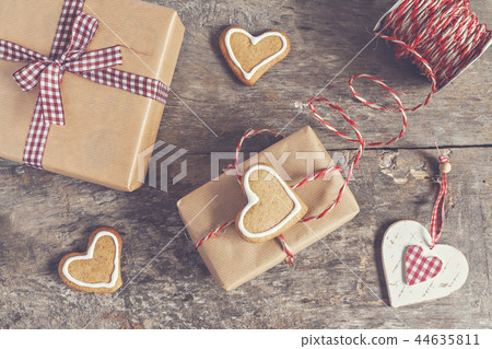 process of packing holiday gifts with effect  44635811