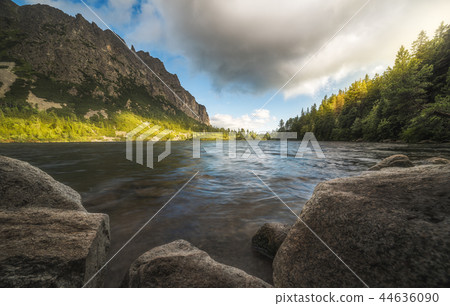 Mountain Lake with Rocks in Foreground 44636090